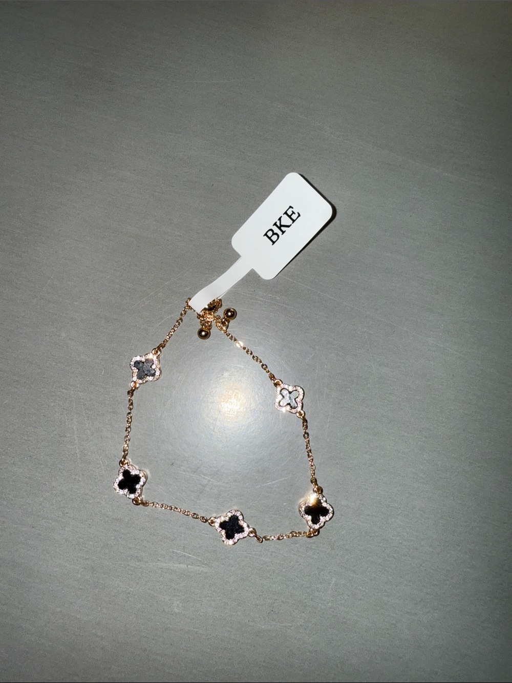 BKE Rose Gold Clover Link Bracelet with Black and White Accents